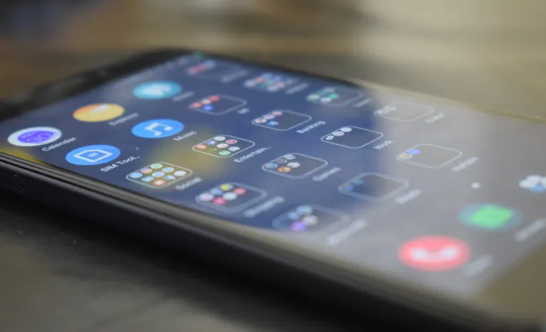Smartphone screen showing app icons representing building a custom AI chatbot