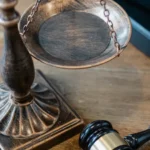 Gavel and scales of justice symbolizing copyright law for AI-generated content