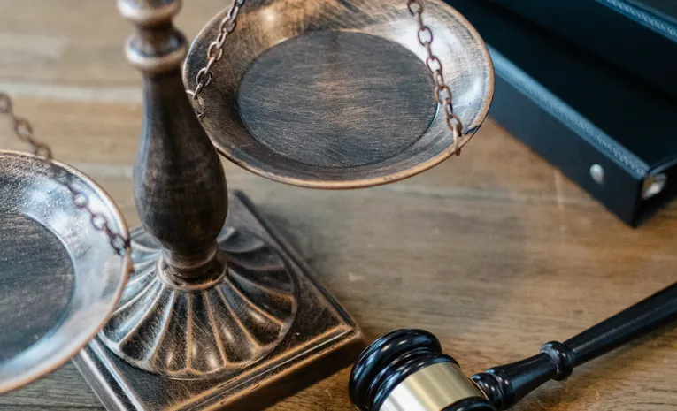 Gavel and scales of justice symbolizing copyright law for AI-generated content