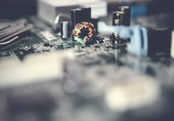 Close-up of a computer motherboard representing laptop internal cleaning