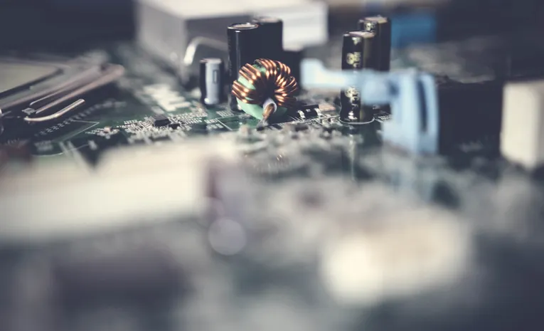 Close-up of a computer motherboard representing laptop internal cleaning