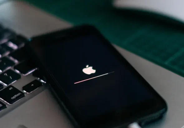 Close-up of a smartphone charging cable connected to the device