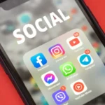 Close-up of a smartphone screen showing app icons representing browser extensions