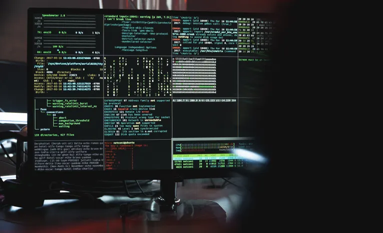 Person typing on a laptop keyboard with a security overlay representing GDPR compliant password management