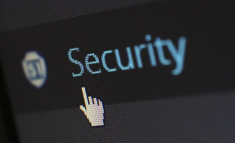 Close-up of a computer screen showing digital security text representing two-factor authentication