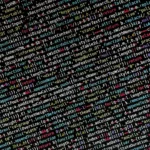 Colorful programming code on a screen representing software complexity and bloat